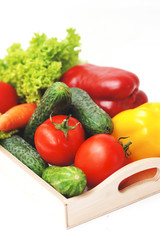 Fresh Summer Vegetables in Wooden Box Isolated. Organic Vegetables Vegetarian Vegan Health food Eatting