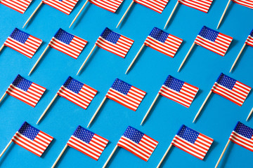 USA flags pattern on blue background