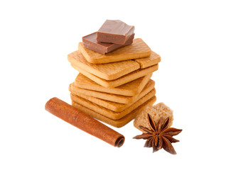 Cookies, chocolate, marshmallow and cinnamon on an isolated background