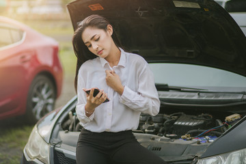  Beautiful girls have problems with broken cars.