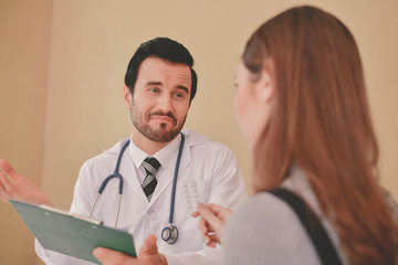 Fototapeta premium Terrible medical concept. Patients stressful in the doctor's diagnosis. Patients are concerned about medical treatment. The doctor's treatment makes the patient afraid.