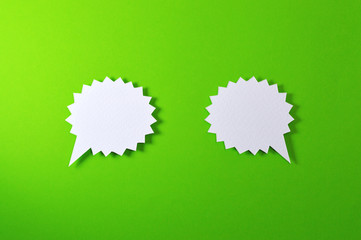 couple of spiny text bubble on green background