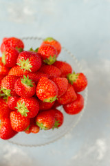 Fresh strawberries on a glas plate, plateau. Isolated.