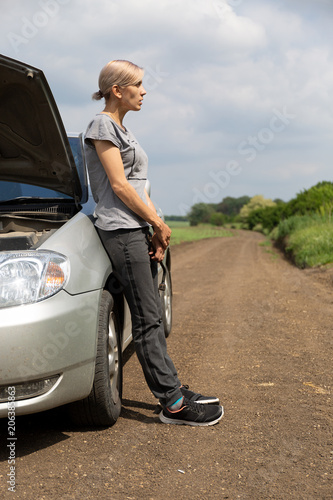 Car Broke Down >> The Girl S Car Broke Down The Girl Stands Near The Car With An Open Car Broke Down >> The Girl S Car Broke Down The Girl Stands Near The Car With An Open