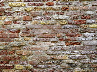 Old weathered brick wall background