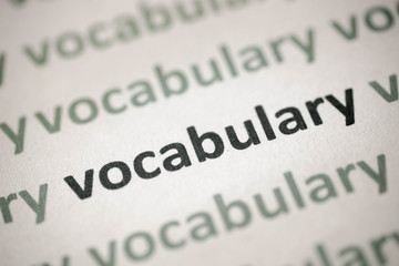 Obraz premium word language printed on paper macro