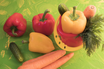 Set of various colorful fresh raw vegetables on a colored background
