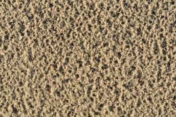 background image wet sand yellow after rain