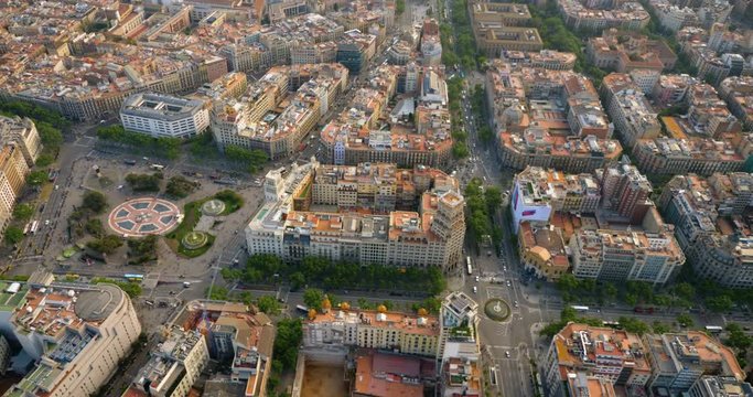 Flying above main street in Barcelona Eixample residential district, Spain