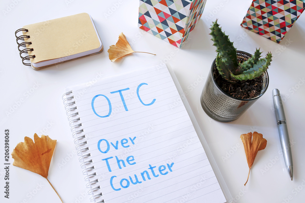 Poster otc over the counter written in notebook on white table