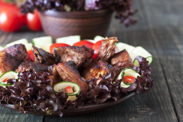 Pork ribs, grilled with fresh vegetables