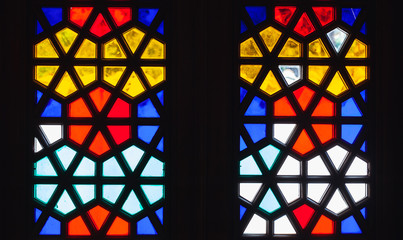 Stained glass window with Arabic pattern