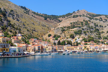 View of bay and beautiful architecture of Symi Island. Greece
