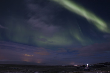 Northern Lights in Icelandic nocturnal landscape