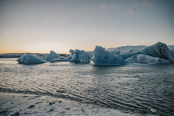 Fototapeta na wymiar Frozen lagoon landscape at sunrise