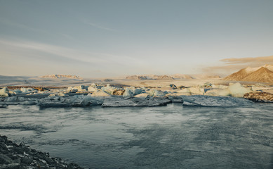 Frozen lagoon landscape at sunset