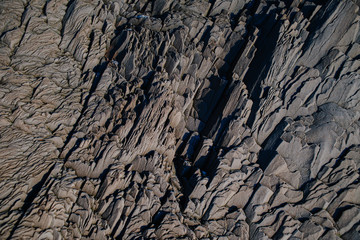 A rock formation at a cliff at Reinsfjara Beach in Iceland
