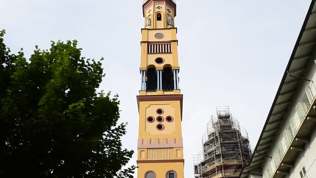 Turin, Piedmont region, Italy. May 2018. Church of Our Lady of Suffrage and Santa Zita. Its bell tower, with its 83 meters, is the fifth highest summit of the city of Turin. Movement bottom to top