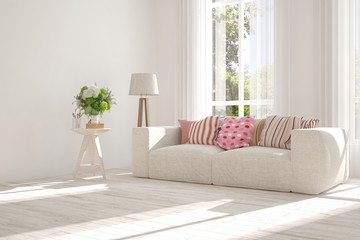 Idea of white room with sofa and summer landscape in window. Scandinavian interior design. 3D illustration