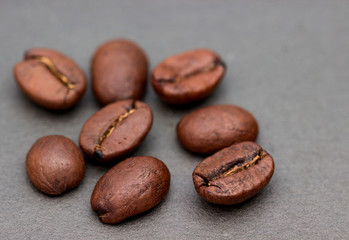 Coffee beans isolated on gray background.