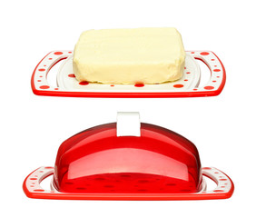 Oiler with butter on white background