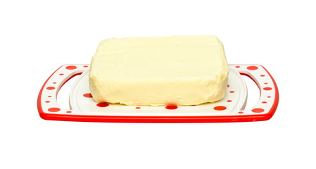 Oiler with butter on white background