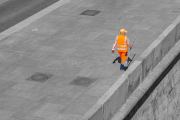Woman in orange overalls