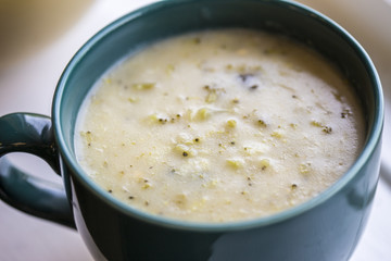 broccoli soup in blue bowl