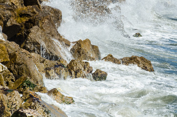 Amazing sea with blue summer wave and rocks, relaxing view of rocks and water