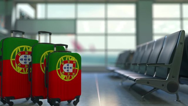 Travel suitcases featuring flag of Portugal. Portuguse tourism conceptual animation