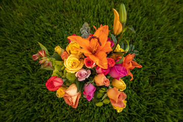 Flower bouquet on grass from above