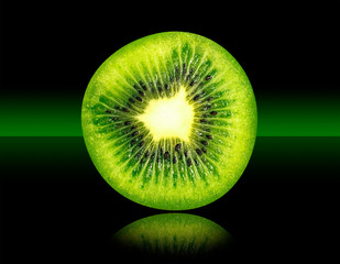 Kiwi, Tropical Fresh Fruit on Mirrored Surface and Green to Black Faded Background