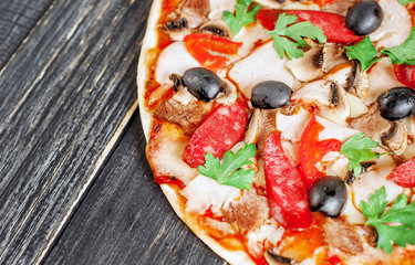 Delicious italian pizza served on wooden table