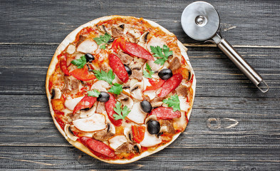 Delicious italian pizza served on wooden table