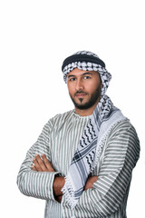 Fototapeta premium Palestinian Arab man in traditional costume standing with his hands folded