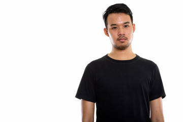 Fototapeta premium Studio shot of young Asian man 