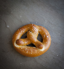 Pretzels with salt on slate