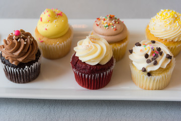 Assorted variety of cupcakes