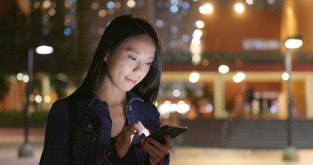 Asian Woman use of mobile phone