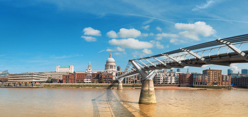 London, panoramic view over Thames river with London skyline on a bright day