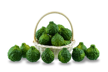 fresh bergamot fruit on wooden basket isolated on white background