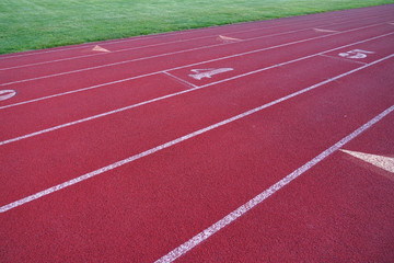 Fototapeta premium red outdoor running track in sport field