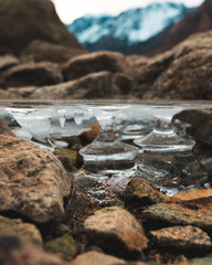 Ice pillars holding up the frozen lake in the Sierra