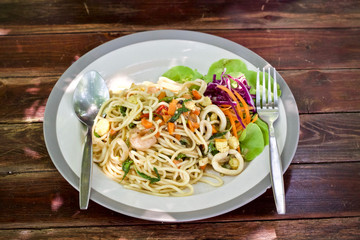 Spaghetti meal food on wooden table