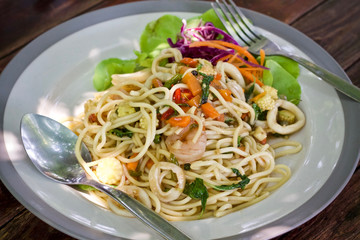Spaghetti meal food on wooden table