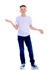 A little boy in a white T-shirt emotionally gestures with his ha