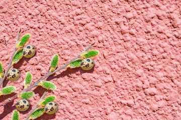 Spring bouquet of yellow primroses willow branches, abstract festive Easter background, top view, copyspace

