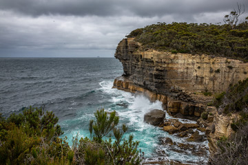 Rugged coastline at the Tasman Arch blowhole, near Port Arthur Tasmania