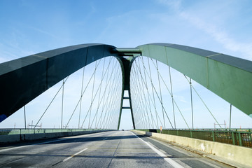 Fehmarn Sound Bridge (German: Fehmarnsundbrücke), suspension bridge with steel arches connecting the German mainland with the island in the Baltic Sea and belongs to the Vogelfluglinie
