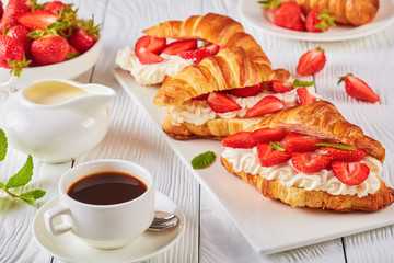 summer breakfast - croissant sandwiches and coffee